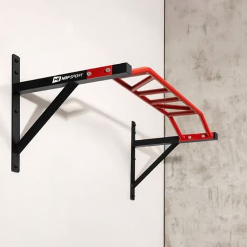 Wall-mounted Hop-Sport red pull up bar installed at head height for optimal chin-up clearance