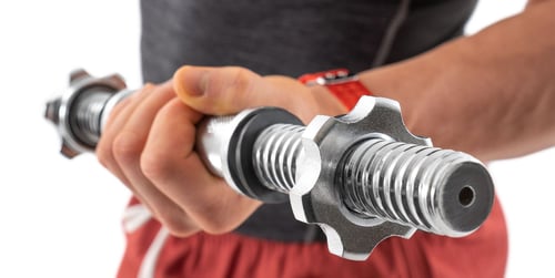 How Much Does a Barbell Weigh? Standard vs Olympic Barbell Compared