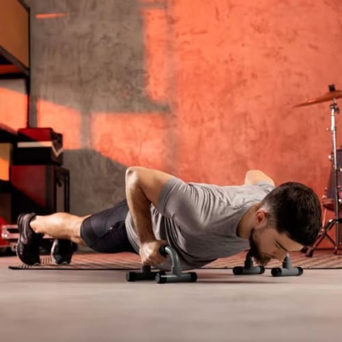 man doing push up at home
