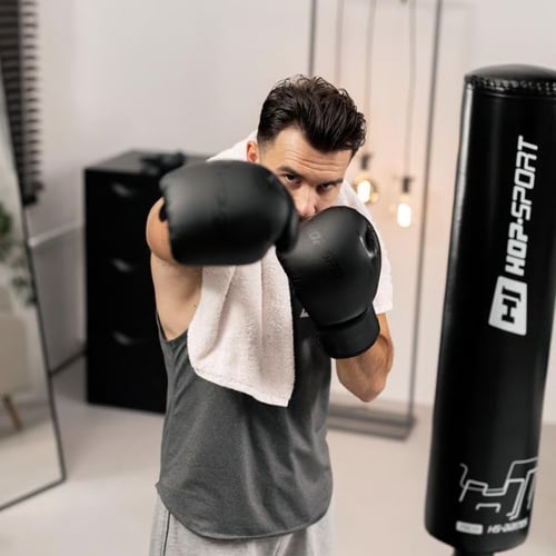 Man Boxing with Freestanding Hop-Sport Bag