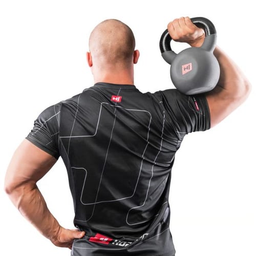 Man holding a Hop-Sport kettlebell on his shoulder while standing, showing grip and control technique